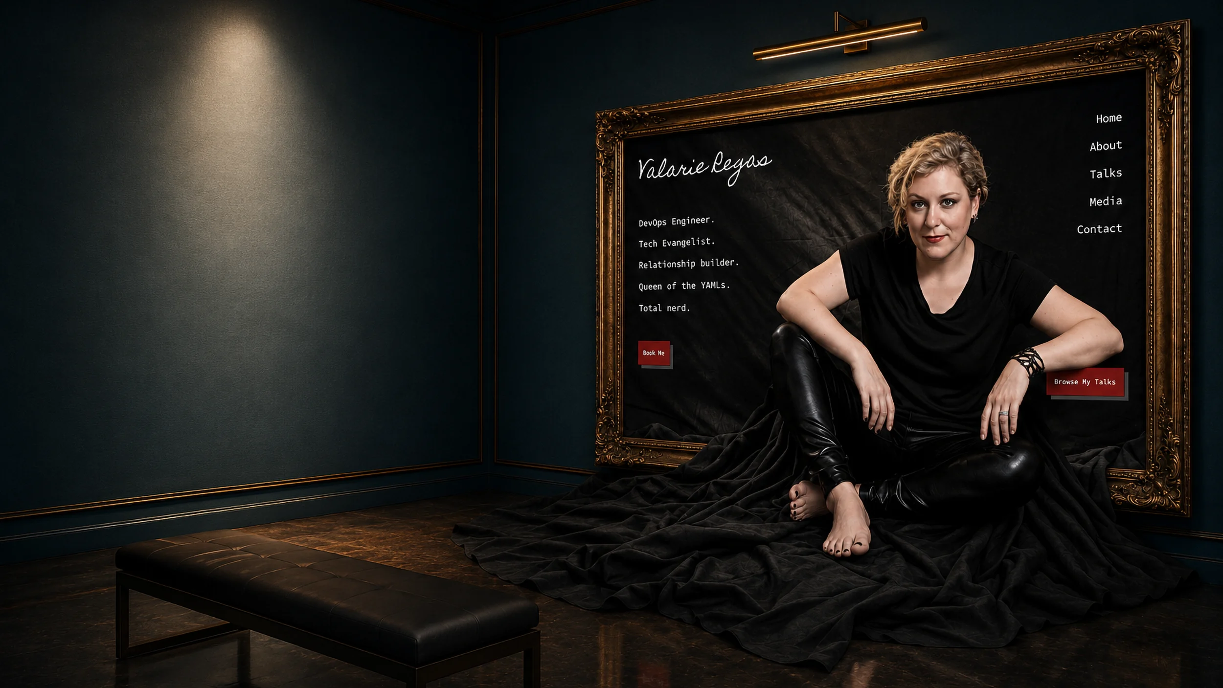 Valarie Regas - DevOps engineer and keynote speaker seated on flowing black fabric spilling from an ornate gilt frame, an empty gallery bench facing it.